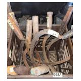 Crate of scythes