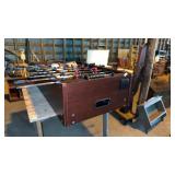 Foosball table with balls legs are off it for