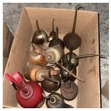 Box of oil cans