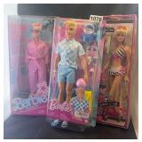2 barbie and 1 Ken