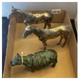 Metal horses and cast iron cow