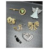 9 misc pins / brooches