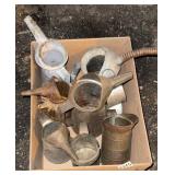 Box of oil cans