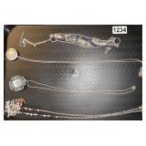 4 costume jewelry necklaces
