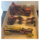 3 cast iron fire toys