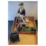 3 cast iron coin banks