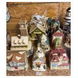 Nine Holiday Village pieces with cords