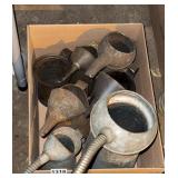Box of oil cans