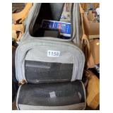 2 Dog travel bags, clippers, vest, grooming items