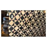 Black and white lap quilt tied