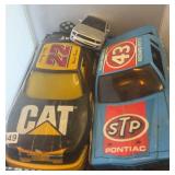 3 plastic cars