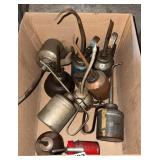 Box of oil cans