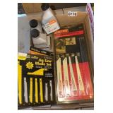 2 cycle oil w/ misc. saw blades