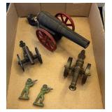 3 cannons and 2 figurines