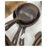 FOUR WAGNER CAST IRON SKILLETS