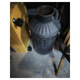 milk can and box of lincoln logs