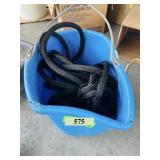 Bucket w/ long rope & a horseshoe