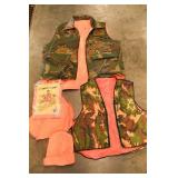 Group lot of hunting clothes: (2) Vests (smaller