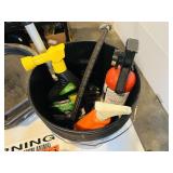 Bucket of cleaning sprays, fire extinguisher,