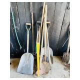 Assortment of shovels, rakes, pitch fork, sledge