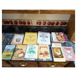 Group of cook books, several local      Located