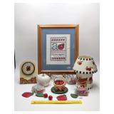 Group of apple décor including ceramic wind