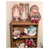 Group of collectible dolls & stuffed animals, one