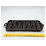 Cast Iron cornbread pan      Located in garage