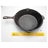 11 inch cast iron skillet, marked 8      Located