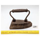 Antique Sad Iron, marked 8      Located in garage