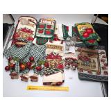 Group of apple dish towels, pot holders, napkin