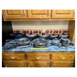 Group of nonstick cookware including T-Fal; a few