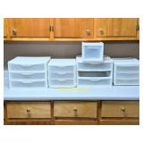 Group of plastic drawers      Located in garage