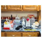 Group of kitchen tools & containers including a