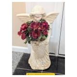 Angel Statue w/ faux flowers; one wing has been