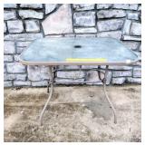 Patio table w/ glass top; approx. 38 in L x 32 in