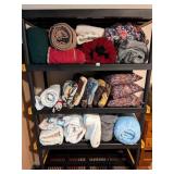 Group of blankets, throws, sheets etc.