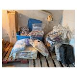 Group of blankets, throws, and sheets, most