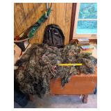 Ghillie Suit (size 4XL/5XL), hunting books, and a