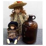 2 Porcelain Dolls and Glass Growler