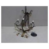 Multicolored Chandelier Needing Repair