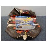 (1) 1,000 Piece Puzzle, (1) Louis Vuitton Purse