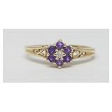 (6) Purple Stones,(1) White Stone in 10k Gold Ring
