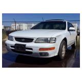 1995 Nissan Maxima-Evidence-Impound-Default
