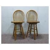 (2) Light Oak Sold Wood Swivel Bar Stools