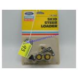1/64 Ertl, New Holland Skid Loader, 1987