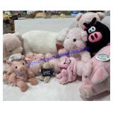 Box of Stuffed Animal Pigs