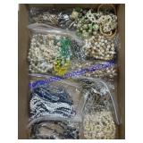 Flat of Costume Jewelry