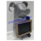 Tin Pig Holding Sign