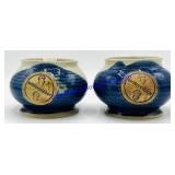 Pair of Cotton Picker Pottery Pieces
